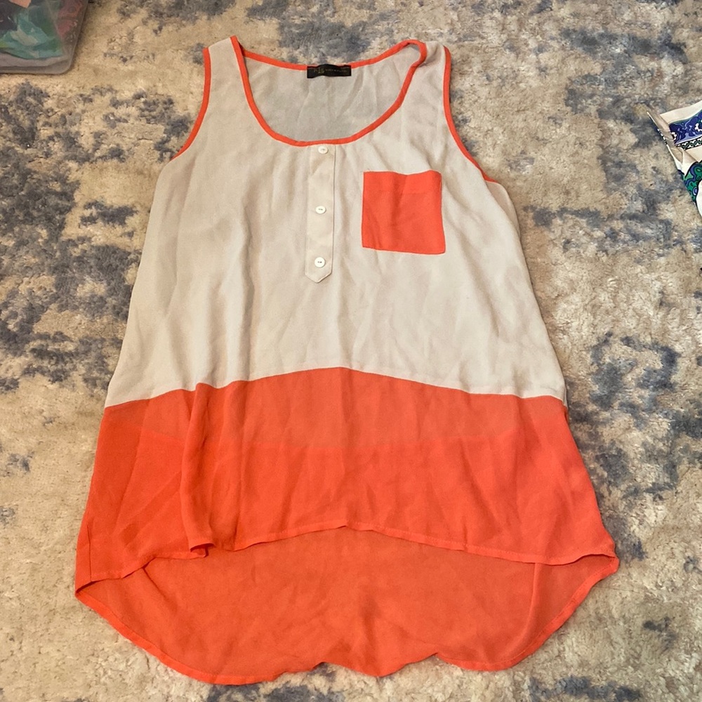 Tan and orange KLD Signature tank